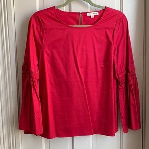 Red bell sleeve blouse